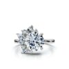 Three stone sterling silver ring with pear and round stones