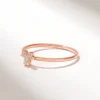 Gold-plated 925 sterling silver ring with a tiny trefoil top
