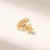 Small gold-plated sterling silver earrings with a premium CZ sapphire stone