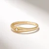Signet-inspired tiny star ring with a clean modern silhouette