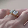 Sterling silver ring with pear-shaped teal sapphire and diamond