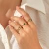 Minimalist triangle ring with a distinctive geometric stone setting