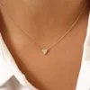 Geometric necklace with pave-set round and baguette CZ diamonds