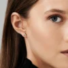 Geometric stud earrings featuring premium CZ diamond stones