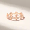 Slim ring band measuring 4.50 mm to 1.10 mm wide