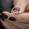 Modern zig zag ring with clean, angular stone arrangement