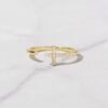 Silver cross open cuff ring with slim gold-plated profile