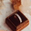 Alternating baguette and round pave diamond band in gold-plated sterling silver