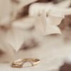 Alternating round stone ring with 0.07 carats total