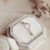 Elegant alternating round CZ stones on a tracer band
