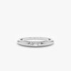 Baguette style stone detailing defines this dome ring