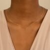Cross pendant necklace measuring 7 by 5 mm