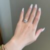 Cluster oval engagement ring with slim 1.8 mm band profile