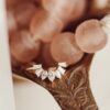 Curved ring featuring pavé-set premium CZ diamond stones