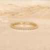 Diamond eternity ring crafted in 925 sterling silver with gold plating