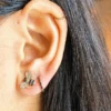 Diamond bumble bee stud earrings with playful motif