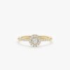Diamond halo engagement ring with a refined, timeless silhouette