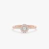 Diamond halo engagement ring with a delicate band and radiant detail