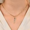 Diamond lightning bolt charm with striking geometric styling