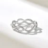 Diamond twisted infinity ring with 4.53mm band width