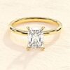Elongated cushion emerald cut diamond engagement ring with sleek band