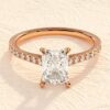Elongated emerald cut ring with 1.50 mm band