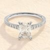 Elongated emerald cut diamond engagement ring with solitaire design