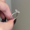 Solitaire ring with a 3-carat emerald cut stone