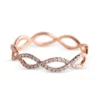 Braided diamond ring with an intricate textured design