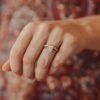 Elegant ring with clean geometric lines and detailed edging