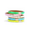 Modern ring with baguette-style stone detailing and enamel band