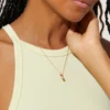 Lipstick necklace with a polished, refined finish