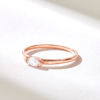 Minimalist ring featuring a graceful marquise-inspired shape