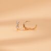 Mixed diamond cluster huggies in a polished thick gold plating
