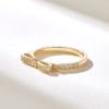 Sterling silver ribbon motif ring with delicate modern styling