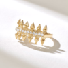 Statement ring with a clean spear-inspired geometric design