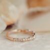 Elegant wave band ring with refined pave setting