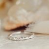 Diamond band ring with graceful flowing wave detail
