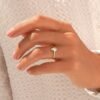 Gold-plated sterling silver ring featuring a pear-shaped stone
