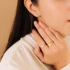 Pearl signet ring featuring a timeless pearl detail