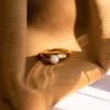 Elegant ring with a soft pearl focal point
