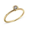 Single diamond bezel ring in thick gold-plated sterling silver