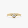 Solitaire diamond engagement ring with a classic elegant profile