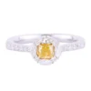 Solitaire ring with white and fancy yellow stone contrast