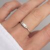 Modern opal ring with a sleek bezel design