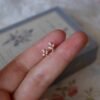 Stud earrings featuring premium CZ diamonds in a pave setting