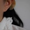 Leaf motif stud earrings with refined diamond detailing and clean lines