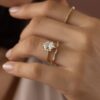 Engagement ring featuring thick gold plating and halo setting