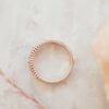 Beaded diamond band in sterling silver with a polished look