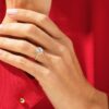 Engagement ring with slim 1.50 mm band and halo setting